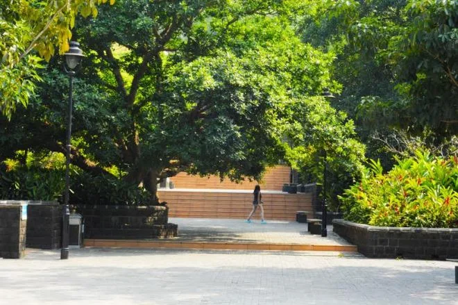 A flight of stairs guarded by Green doorway