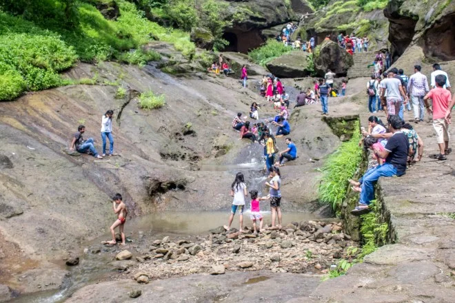 Kids playing around falls